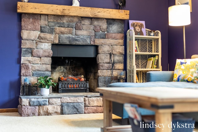 unfurnished bedroom with a lit fireplace