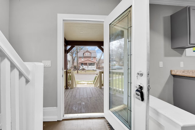 entryway featuring visible vents and hardwood / wood-style flooring