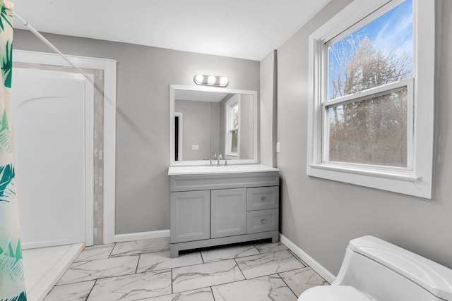 full bath featuring toilet, marble finish floor, a shower with curtain, and baseboards