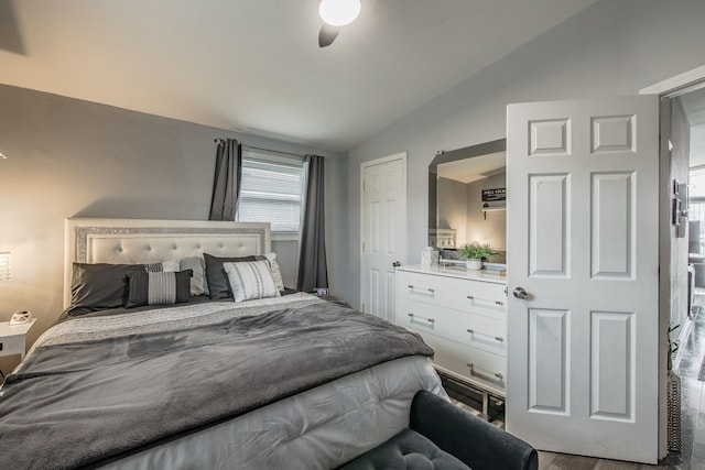 bedroom with lofted ceiling and ceiling fan