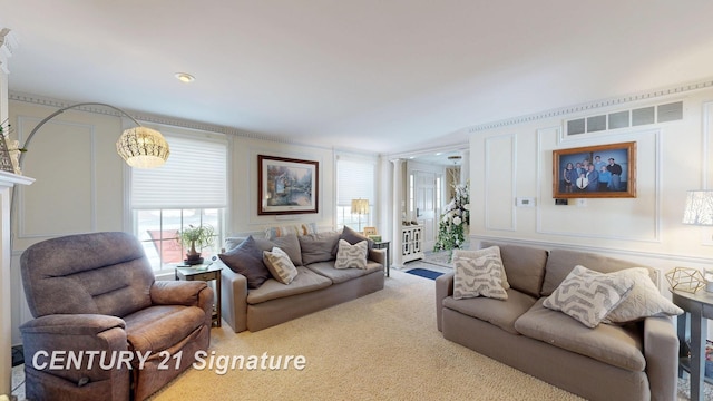 carpeted living area with visible vents