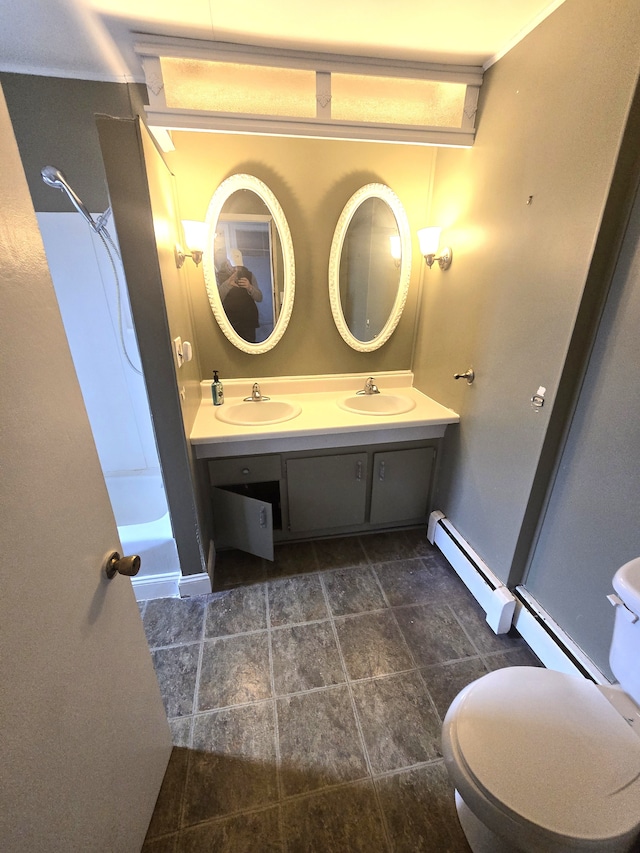 7993 Church Rd, Grosse Ile, MI 48138 - full bathroom with a baseboard radiator, double vanity, a sink, and walk in shower