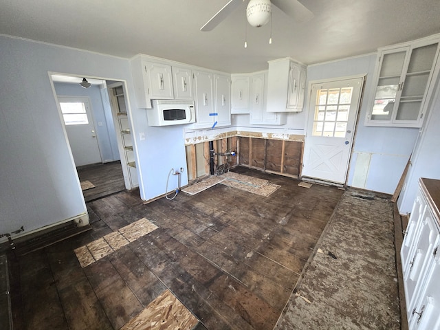 7993 Church Rd, Grosse Ile, MI 48138 - kitchen featuring dark wood-style floors, a wealth of natural light, ceiling fan, and white microwave