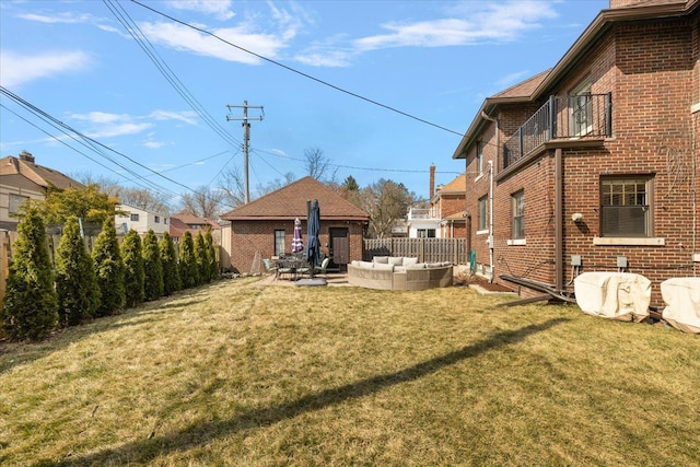 view of yard featuring an outdoor hangout area and fence