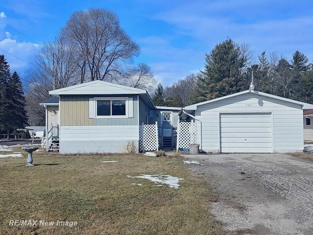 garage featuring driveway