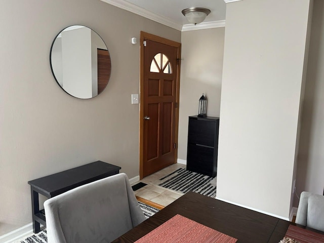 entryway featuring ornamental molding and baseboards