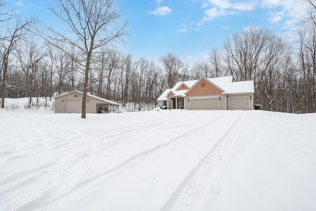 view of yard layered in snow