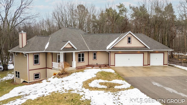 view of front of property with a chimney, a shingled roof, covered porch, an attached garage, and driveway