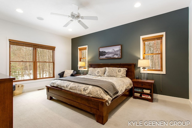 carpeted bedroom featuring baseboards, a ceiling fan, and recessed lighting