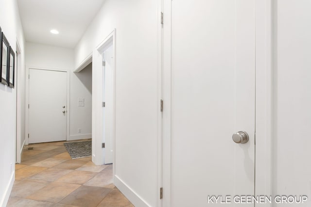 hallway featuring recessed lighting