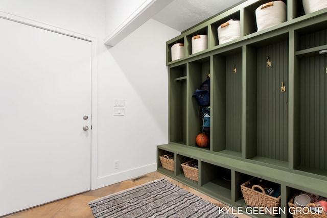 mudroom with visible vents and baseboards