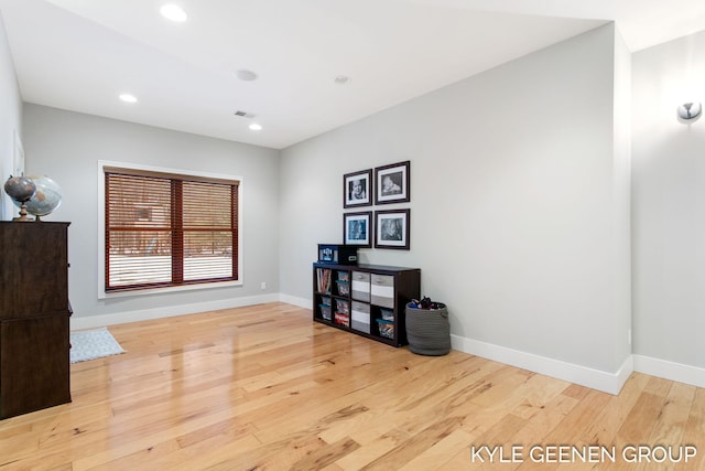 misc room with visible vents, baseboards, wood finished floors, and recessed lighting