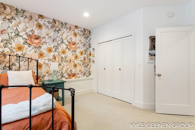 carpeted bedroom with baseboards, a closet, recessed lighting, and wallpapered walls