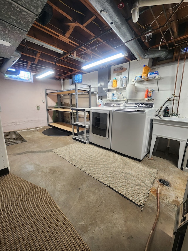 basement with separate washer and dryer