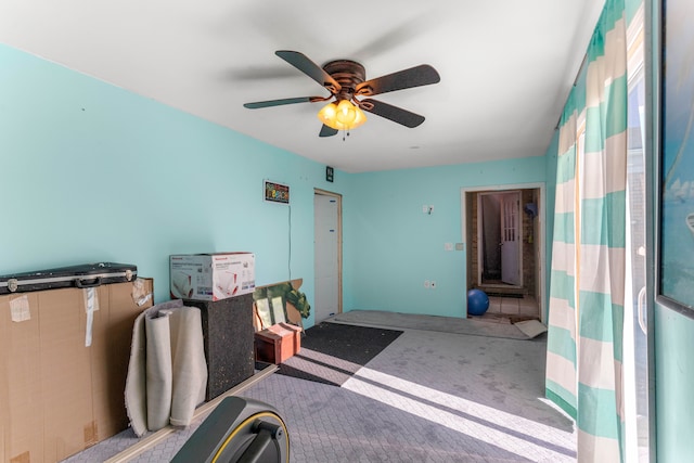 bedroom with ceiling fan and carpet