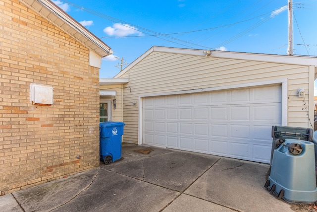 garage featuring driveway