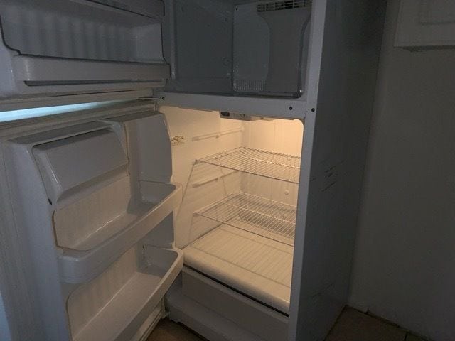 interior details with refrigerator