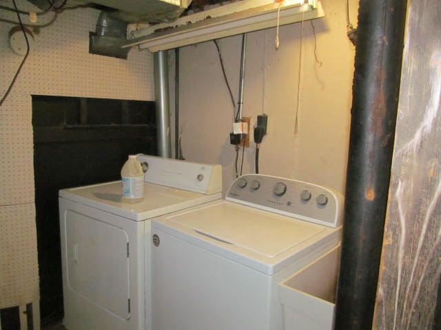 laundry room with washing machine and dryer and laundry area