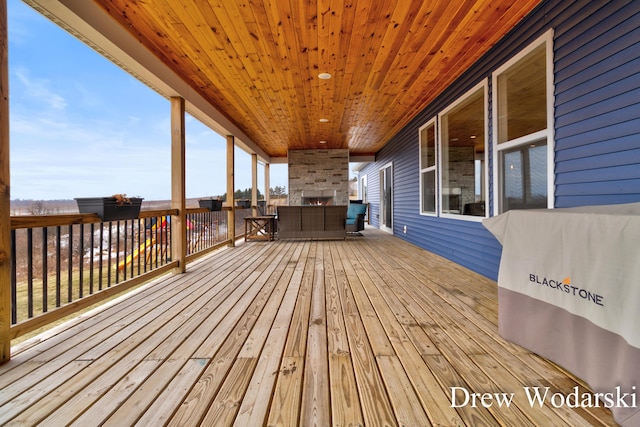 wooden terrace featuring outdoor lounge area