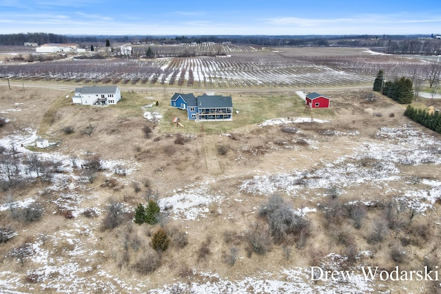 birds eye view of property featuring a rural view