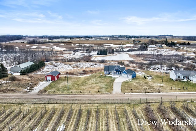 birds eye view of property featuring a rural view