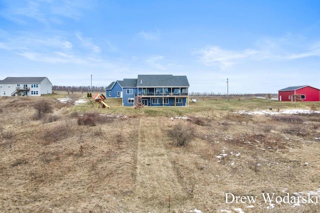 view of front of home with a playground