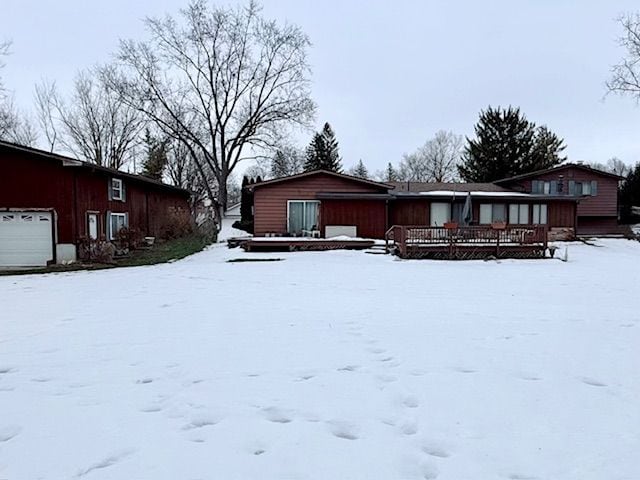 view of front of property featuring a wooden deck