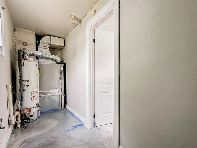 utility room featuring gas water heater