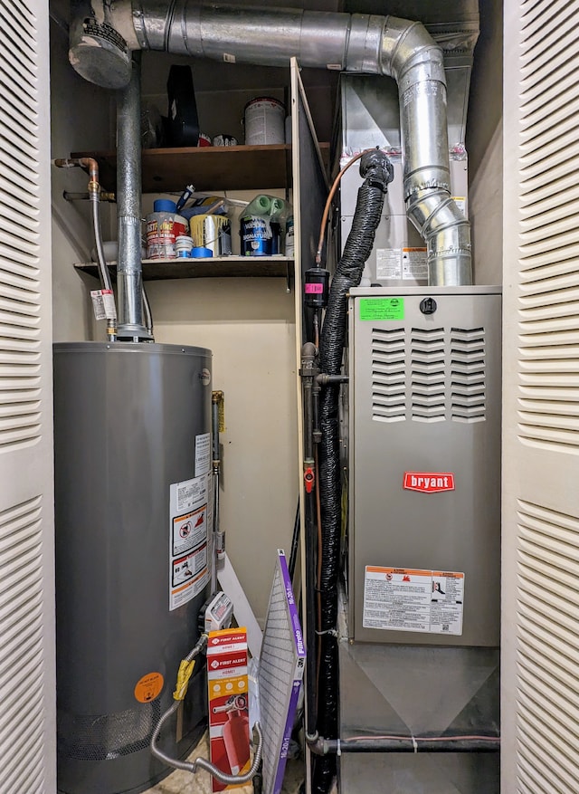 utility room featuring gas water heater