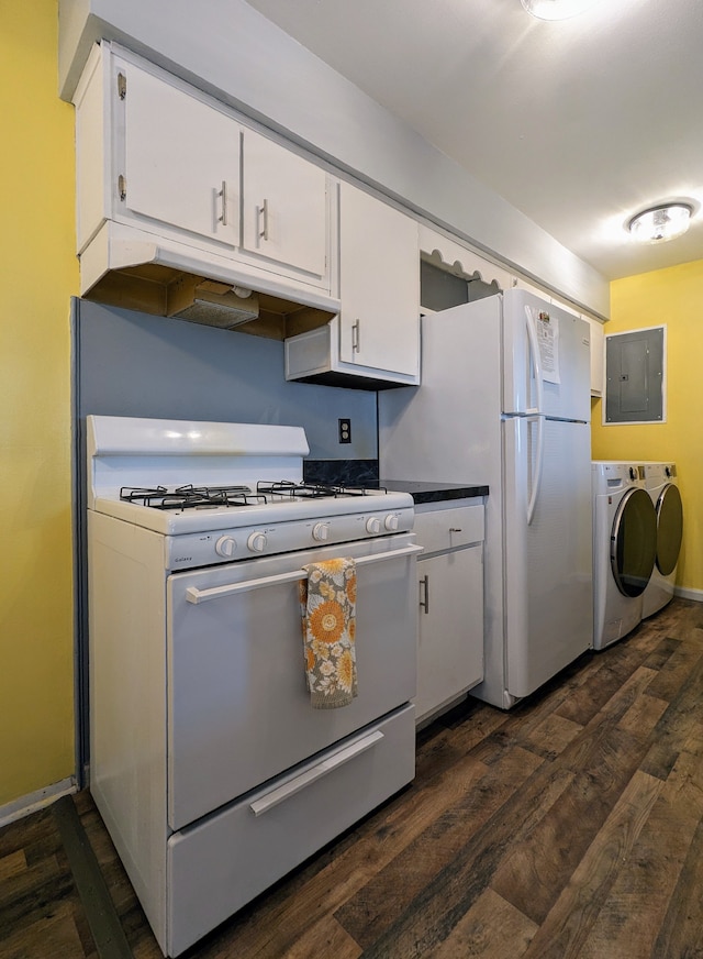 kitchen featuring white appliances, electric panel, dark wood-style floors, washing machine and clothes dryer, and white cabinetry