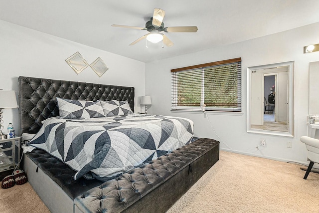 bedroom featuring a ceiling fan, carpet, and baseboards