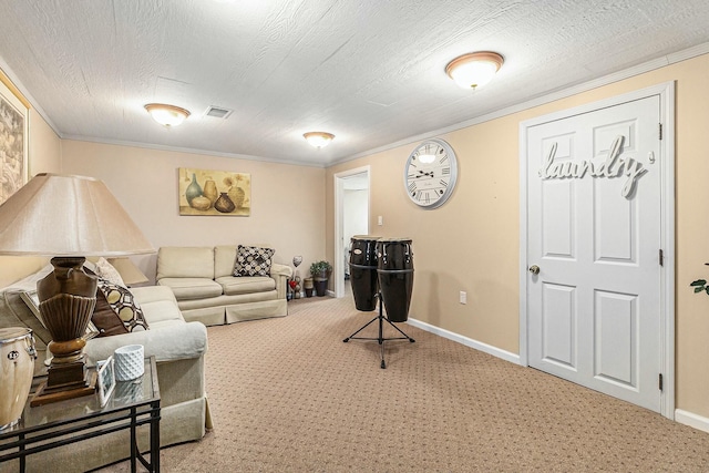 living area featuring carpet floors, ornamental molding, a textured ceiling, and baseboards