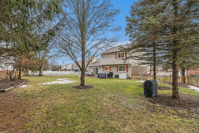 view of yard featuring a fenced backyard