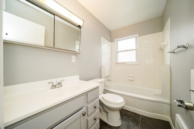 bathroom featuring vanity, shower / bathing tub combination, tile patterned flooring, and toilet