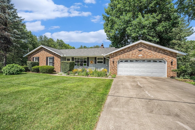 ranch-style house with a front yard, concrete driveway, and brick siding