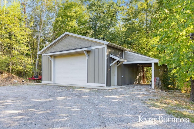 garage featuring a garage and driveway