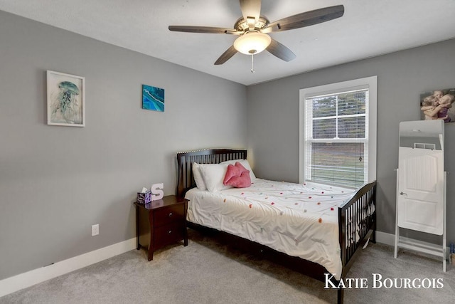 bedroom featuring a ceiling fan, baseboards, and carpet flooring