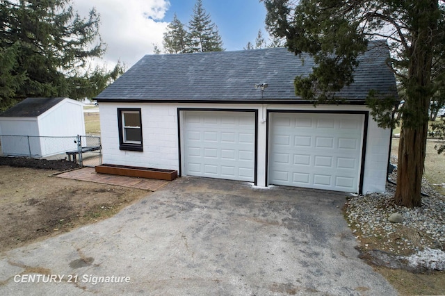 detached garage with fence