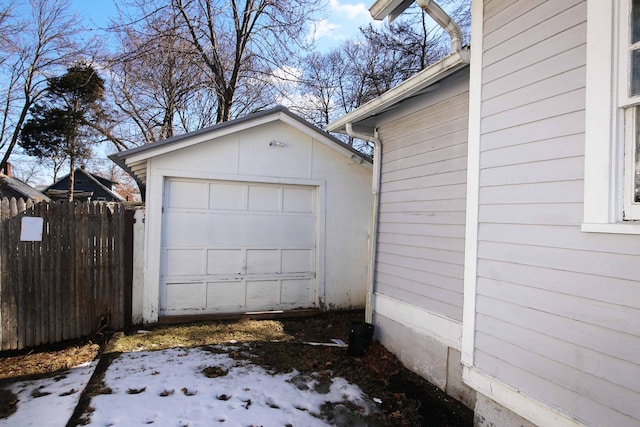 detached garage with fence