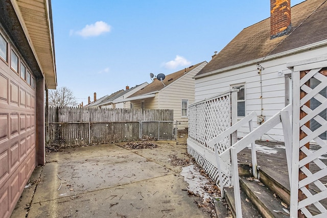 view of yard featuring a patio and fence