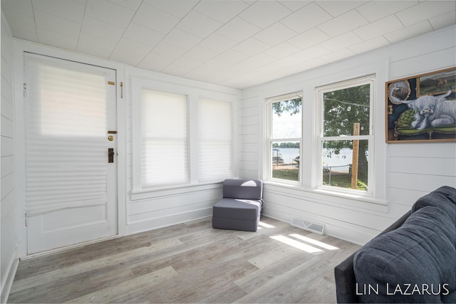 sunroom featuring visible vents