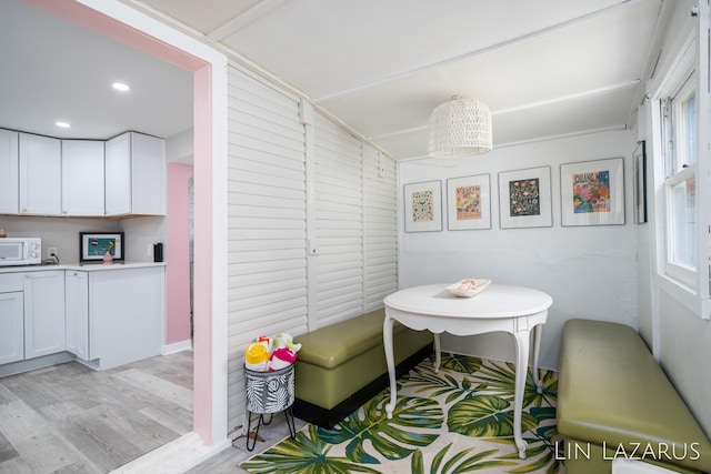 dining room featuring recessed lighting and light wood-style floors