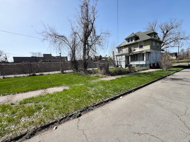 3674 Mount Elliott St, Detroit, MI 48207 - view of side of home with fence