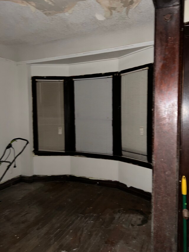 3674 Mount Elliott St, Detroit, MI 48207 - empty room featuring baseboards and wood finished floors
