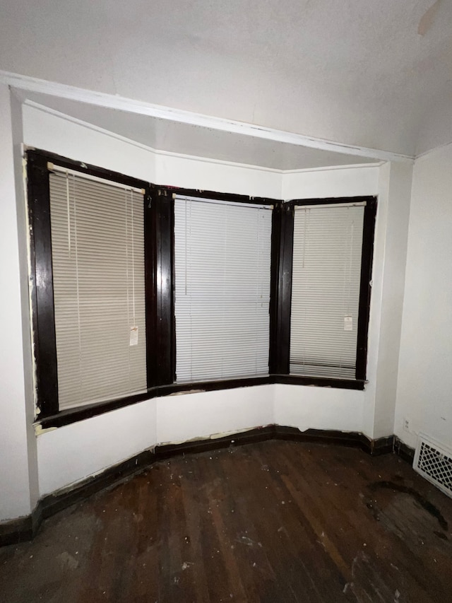 3674 Mount Elliott St, Detroit, MI 48207 - unfurnished room with visible vents, baseboards, and wood finished floors
