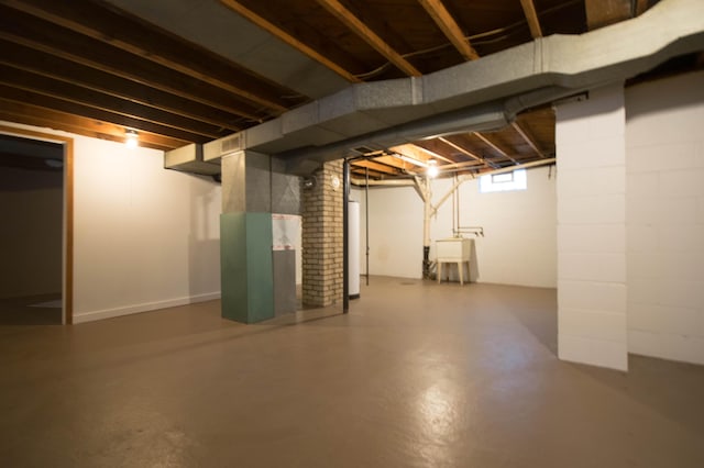 basement featuring a sink