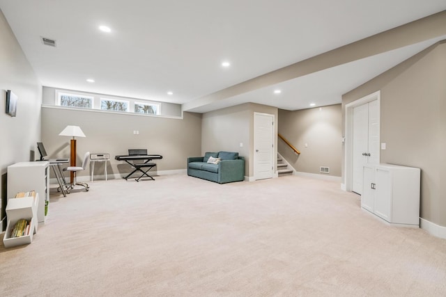 sitting room with stairway, visible vents, carpet flooring, and recessed lighting