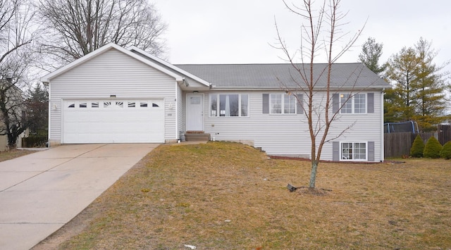 ranch-style house featuring concrete driveway, an attached garage, fence, and a front yard