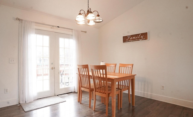 dining room with visible vents, baseboards, vaulted ceiling, french doors, and dark wood-style floors