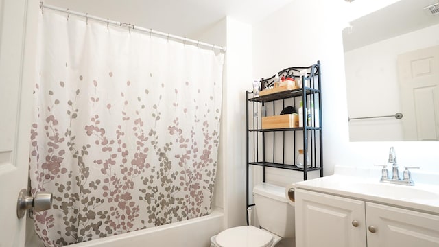 full bathroom featuring toilet, shower / bath combination with curtain, vanity, and visible vents